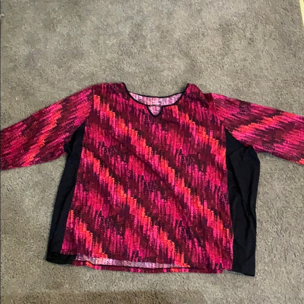 We have this Tutone red snake skin pattern blouse